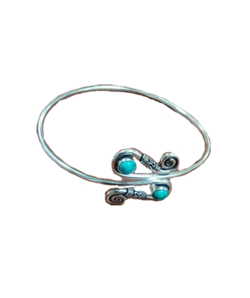 Silver armcuff with turquoise stone
